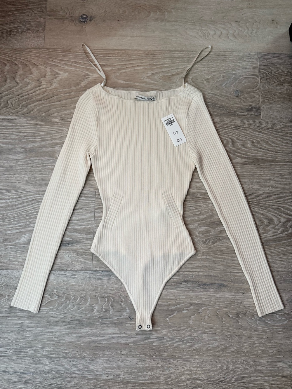 Abercrombie & Fitch Ribbed Long-Sleeve Spaghetti-Strap Bodysuit in Cream